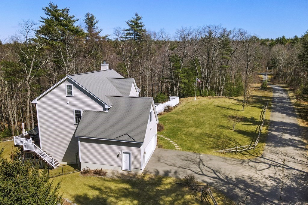 95 Lunenburg Road Townsend, MA 01474 - Photo 31 of 42 a view of a house with a yard