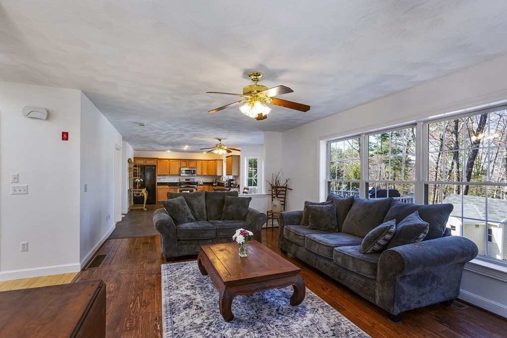 95 Lunenburg Road Townsend, MA 01474 - Photo 9 of 42 a living room with furniture and a large window