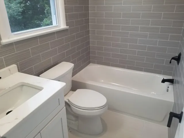 a bathroom with a bathtub