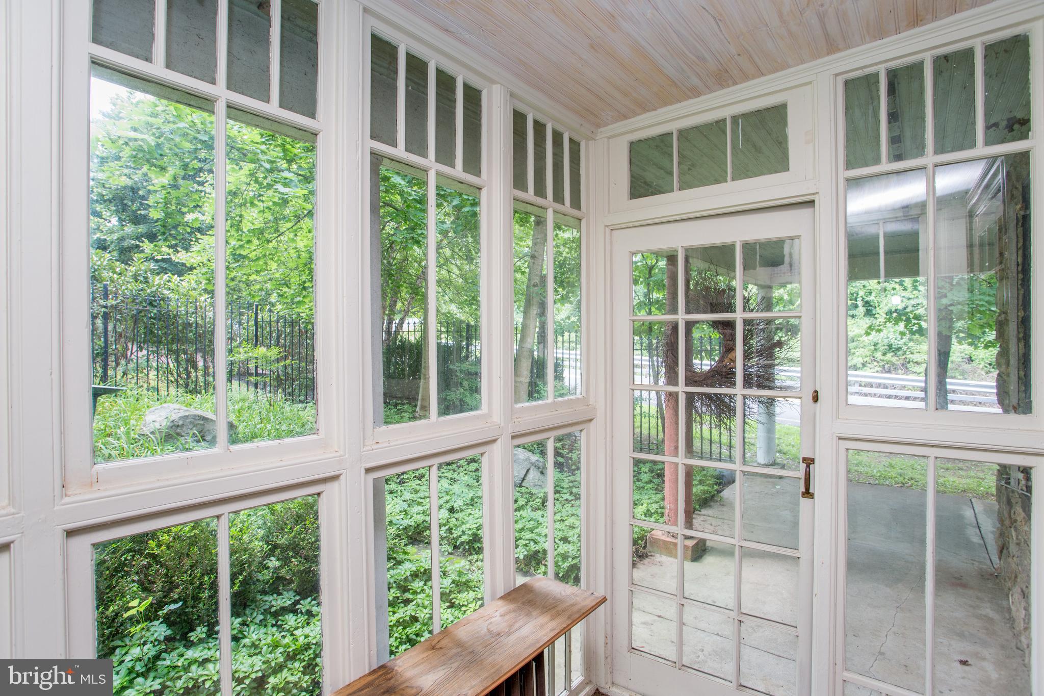 3115 Gallows Hill Road Riegelsville, PA 18077 - Photo 23 of 75 Glass porch on side of house