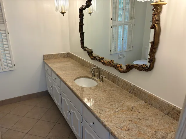 a view of an empty room and a window