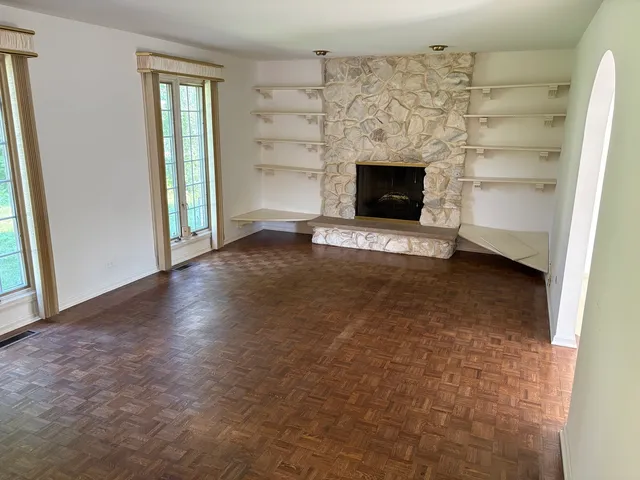 a bathroom with a sink a mirror and a shower