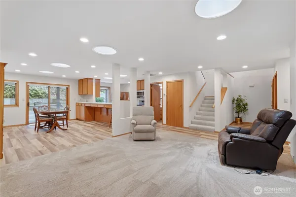 a living room with furniture and a table