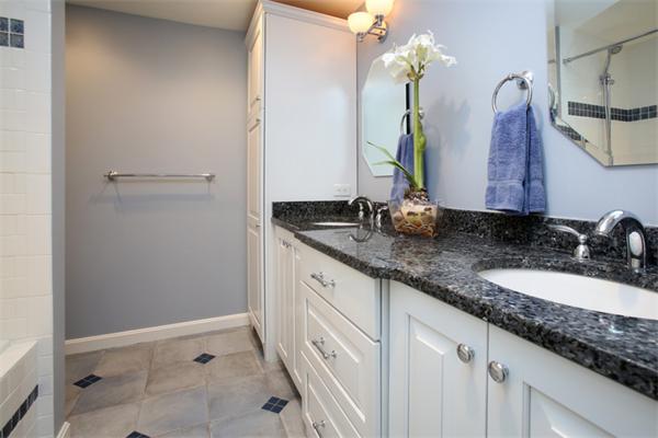 68 Pickwick Way, Unit 68 Wayland, MA 01778 - Photo 8 of 15 a bathroom with a granite countertop sink and a mirror
