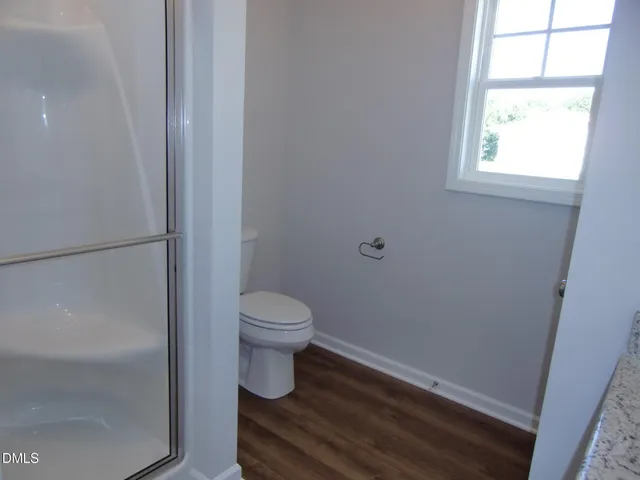 a view of a hallway with closet