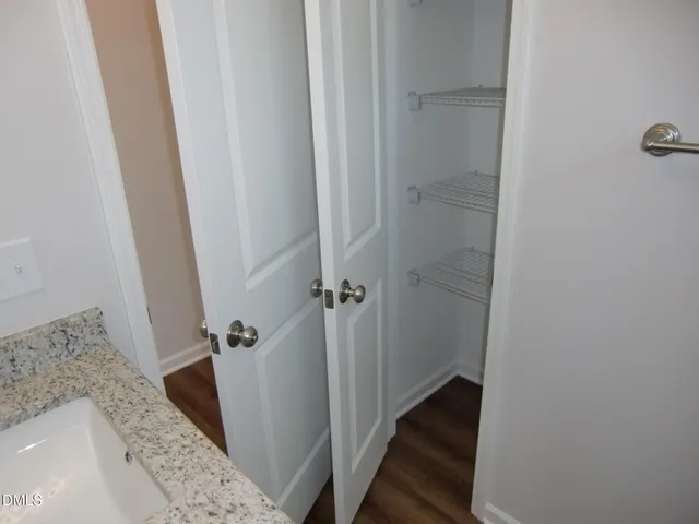 a view of a livingroom with a furniture and window