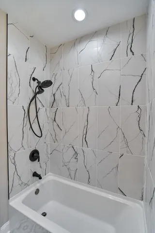 a bathroom with a bathtub