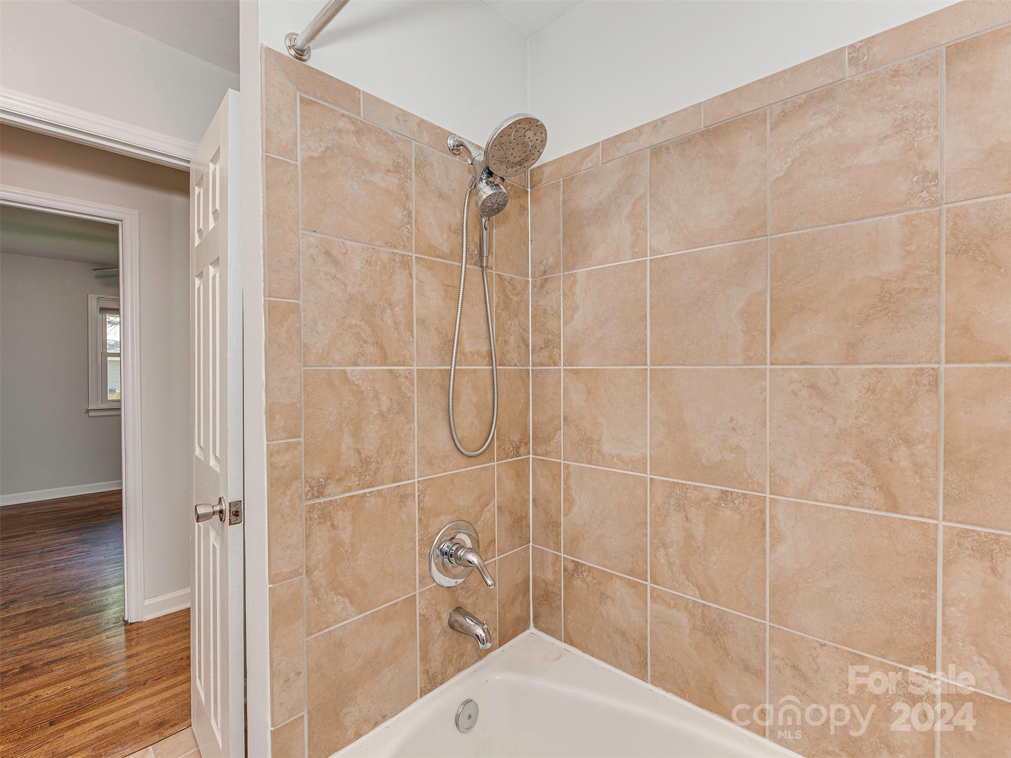 5541 Toano Road Charlotte, NC 28215 - Photo 19 of 35 a bathroom with a shower