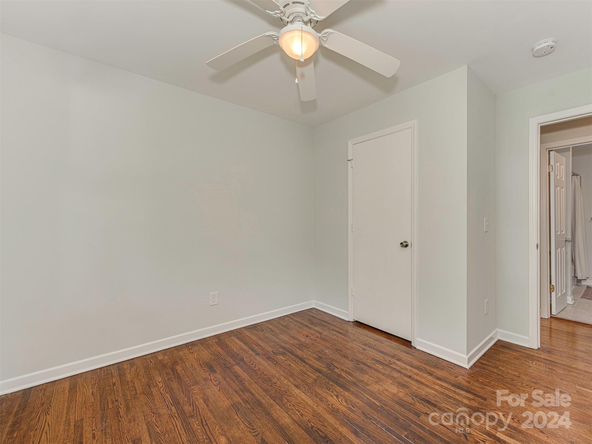 5541 Toano Road Charlotte, NC 28215 - Photo 20 of 35 wooden floor in an empty room