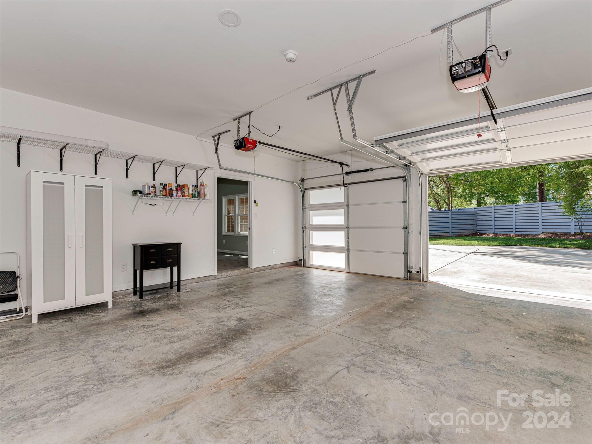 5541 Toano Road Charlotte, NC 28215 - Photo 26 of 35 a view of a livingroom with a fireplace and window