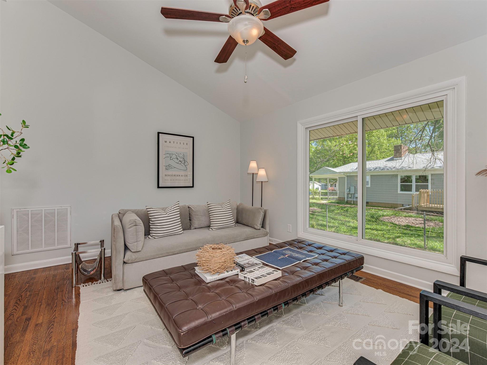 5541 Toano Road Charlotte, NC 28215 - Photo 4 of 35 a living room with furniture and a window