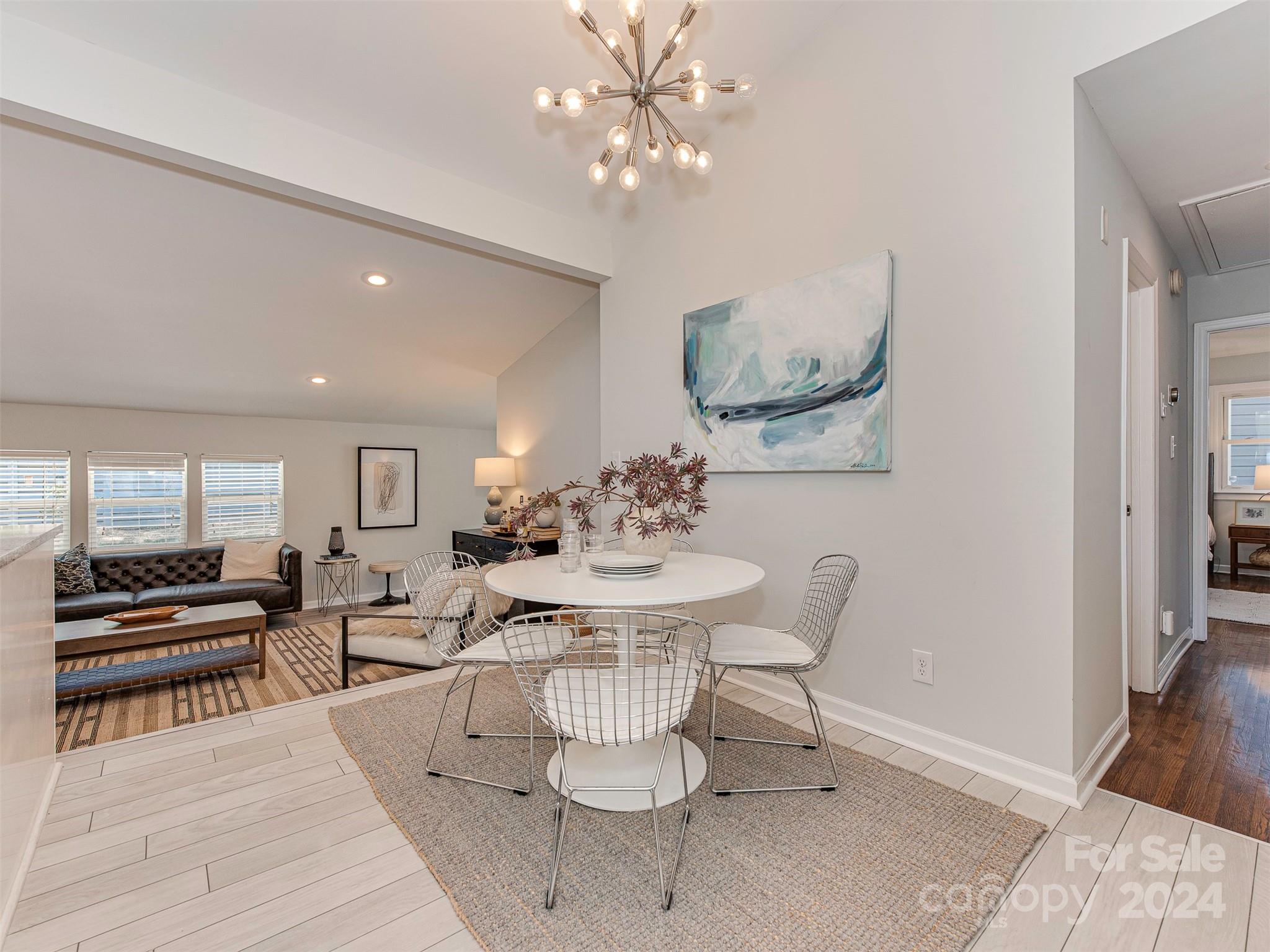 5541 Toano Road Charlotte, NC 28215 - Photo 6 of 35 a view of a dining room with furniture and wooden floor