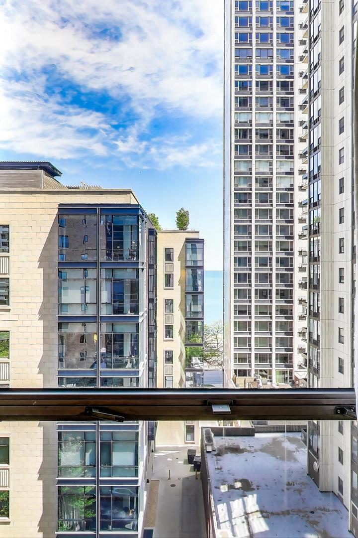 1310 North Ritchie Court, Unit 9D Chicago, IL 60610 - Photo 23 of 27 a view of a building from a window