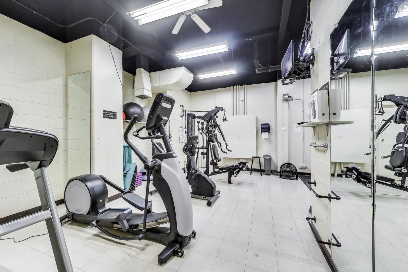 1310 North Ritchie Court, Unit 9D Chicago, IL 60610 - Photo 26 of 27 a view of a room with gym equipment