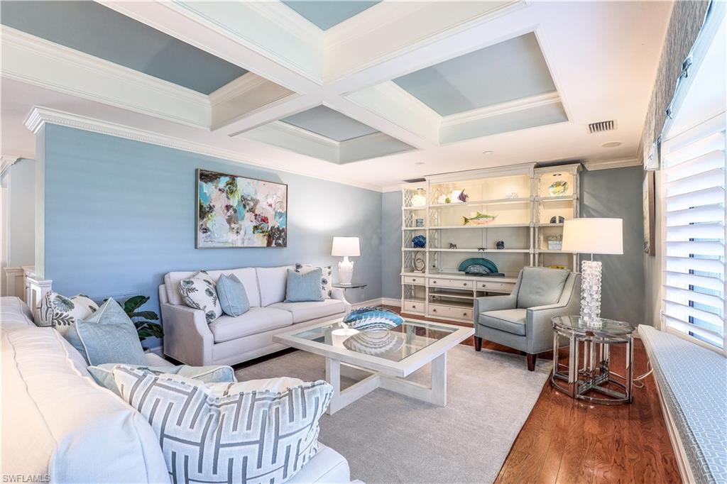 635 Anchor Rode Drive Naples, FL 34103 - Photo 11 of 50 a living room with furniture or couch and a large window