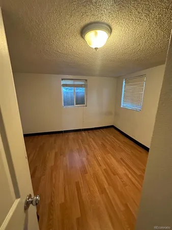 a view of an empty room with a sink
