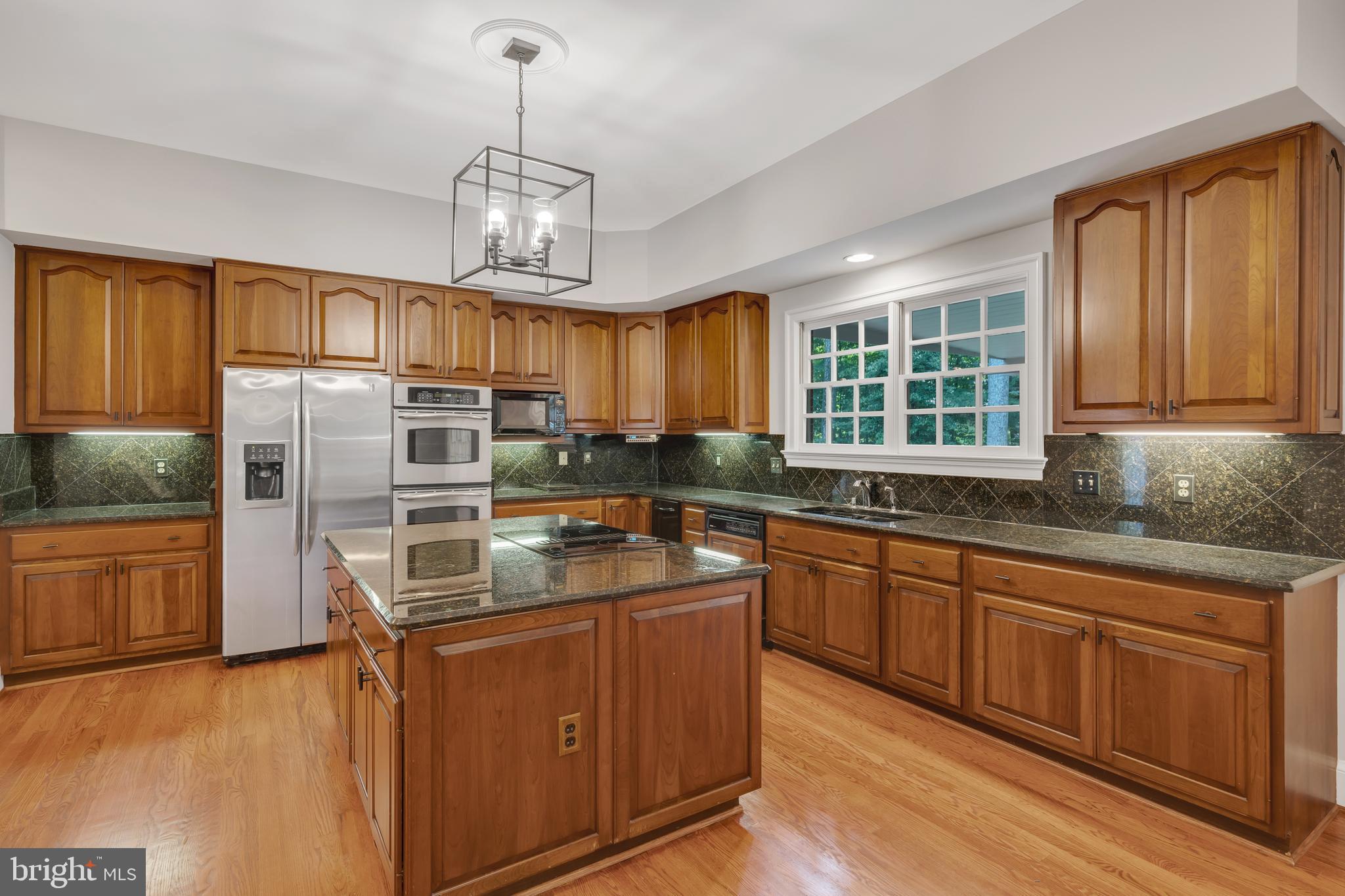 190 Falcon Ridge Road Great Falls, VA 22066 - Photo 14 of 74 Extra Spacious Open Kitchen with Island