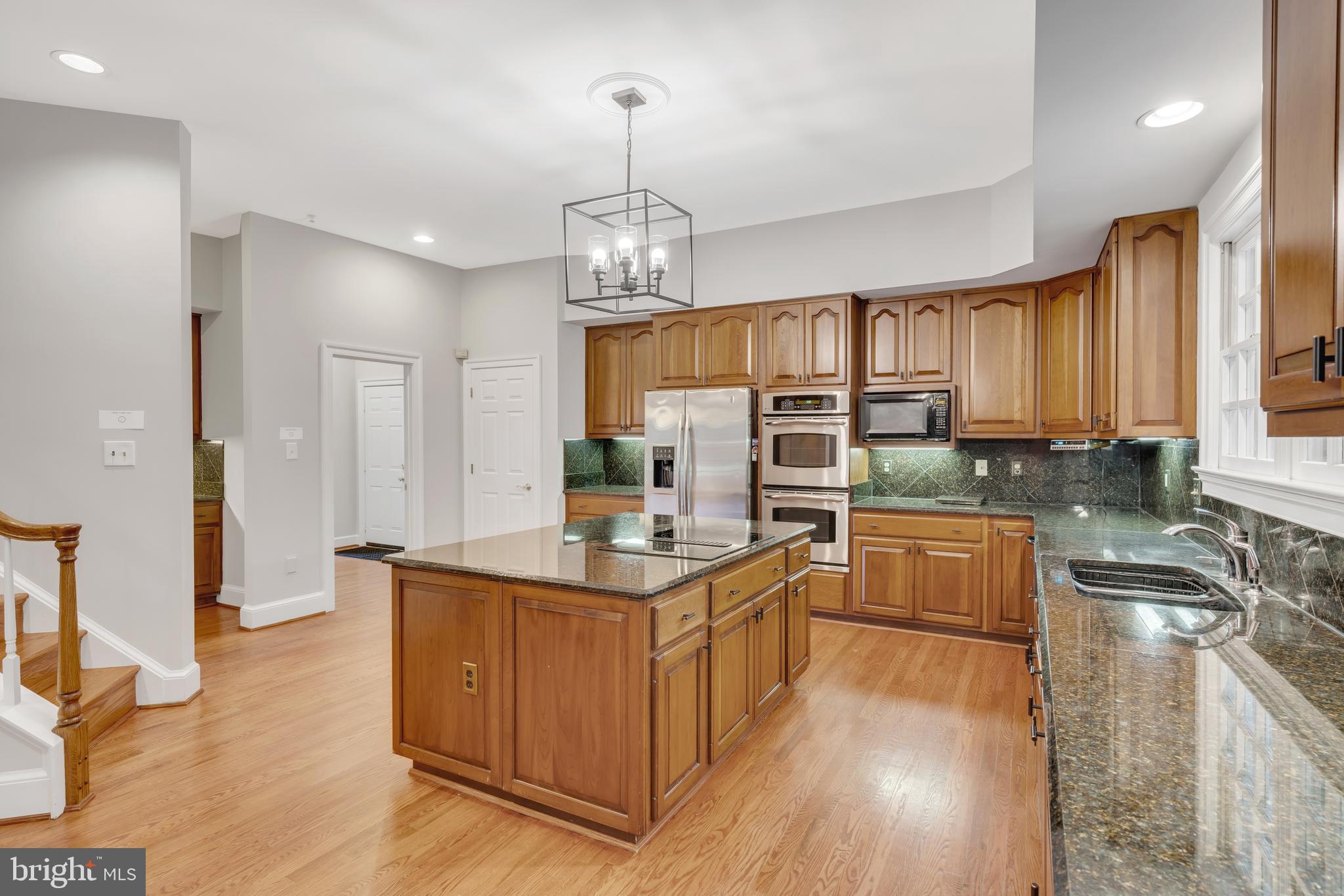 190 Falcon Ridge Road Great Falls, VA 22066 - Photo 15 of 74 SS Appliances, Granite Island w/ cooktop & Storage