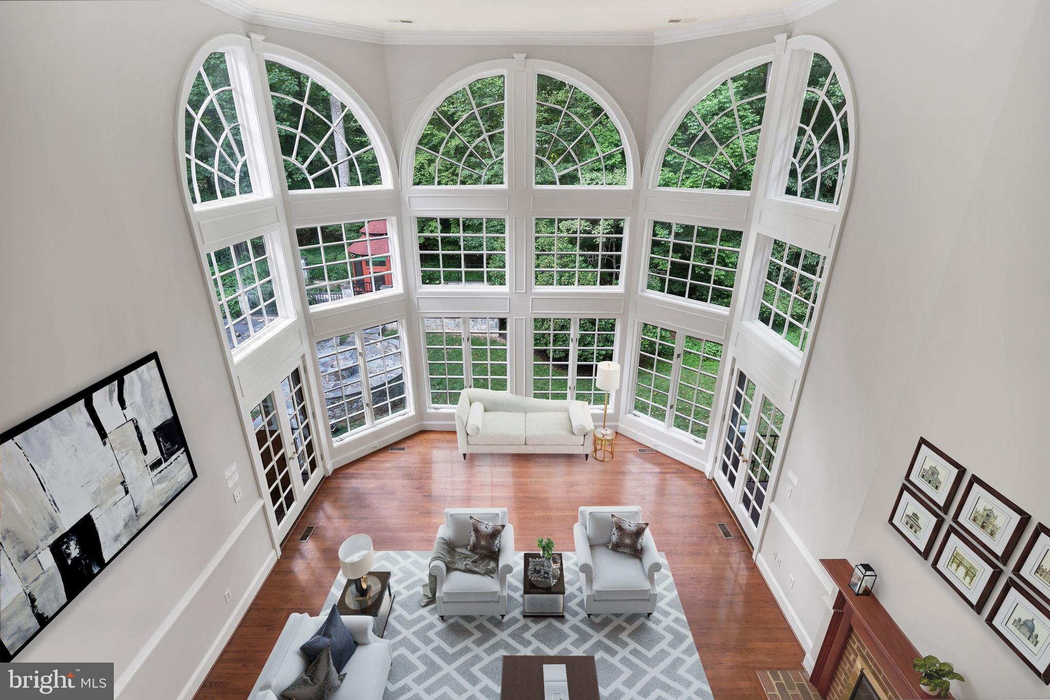 190 Falcon Ridge Road Great Falls, VA 22066 - Photo 28 of 74 Family Room, Floor-to-Ceiling windows // V.Staged