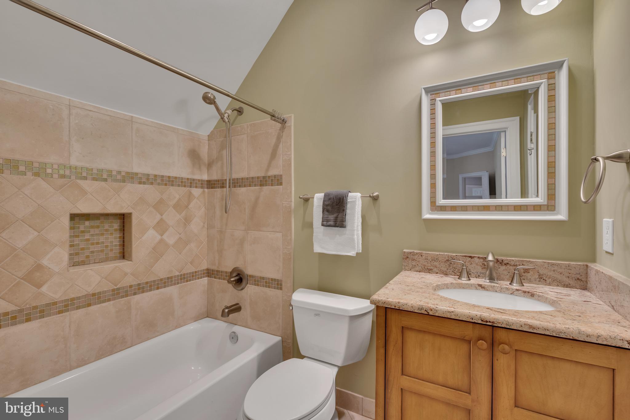 190 Falcon Ridge Road Great Falls, VA 22066 - Photo 34 of 74 Ensuite Bathroom #2 with Custom Italian Tiles