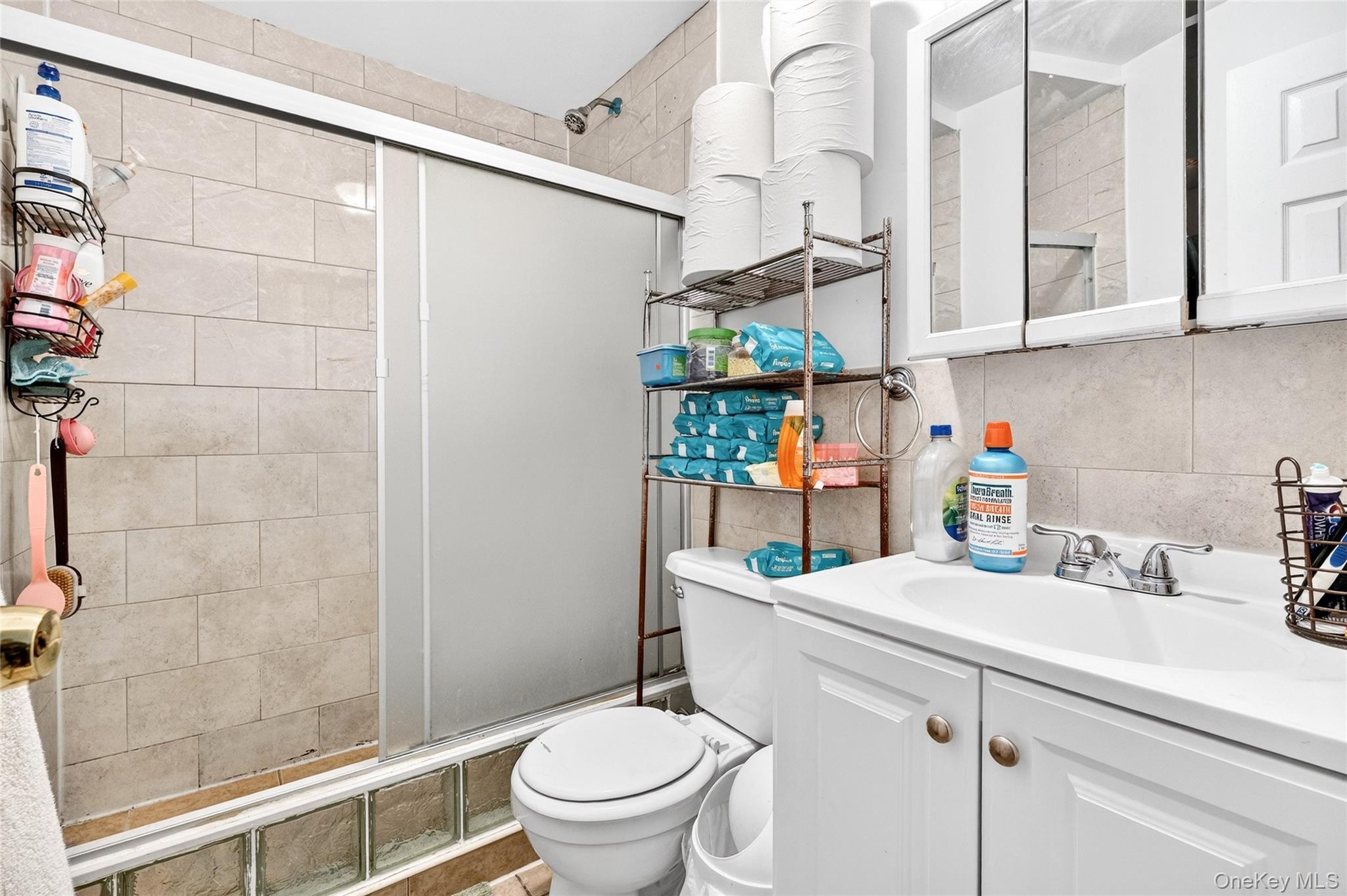 1459 Rosedale Avenue Bronx, NY 10460 - Photo 36 of 37 Bathroom featuring a stall shower and vanity