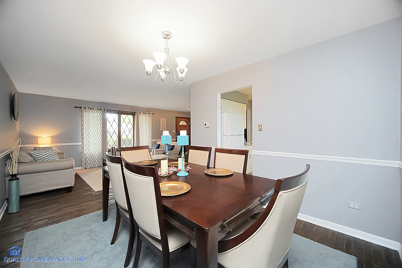 5119 Riverside Drive Richton Park, IL 60471 - Photo 9 of 26 a view of a dining room with furniture and chandelier