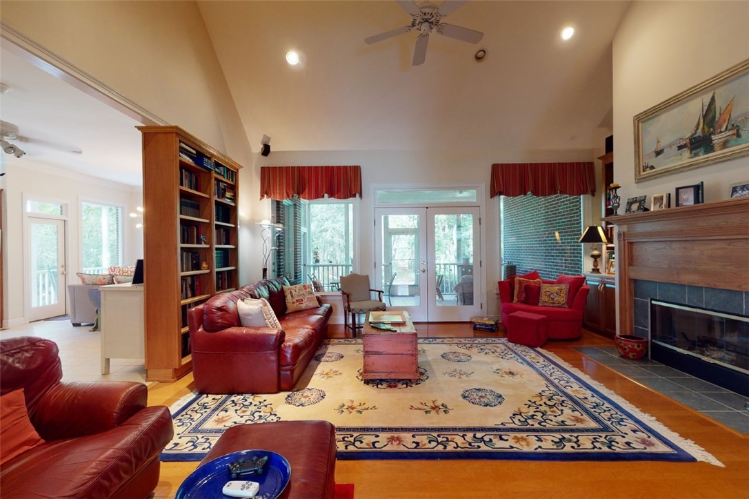 113 Mariners Walk Brunswick, GA 31523 - Photo 8 of 39 Great room with large screened porch through French doors