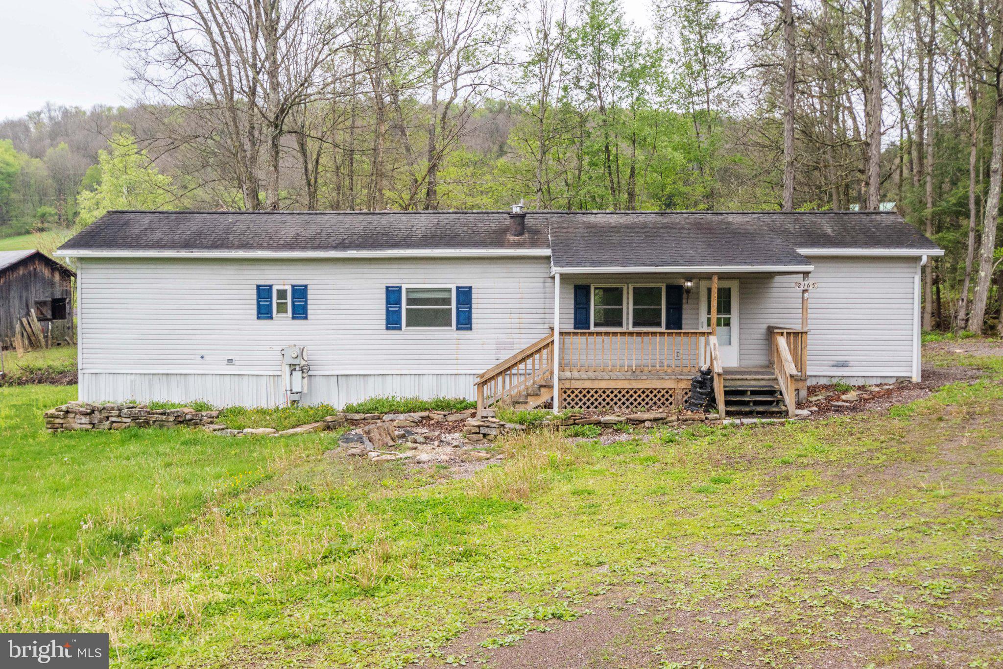 2165 Jennings Road Jennings, MD 21536 - Photo 2 of 23 Charming home nestled in nature's embrace.
