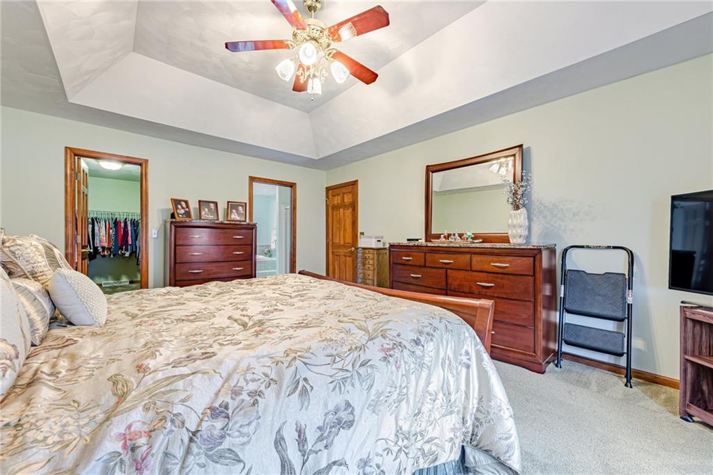 612 Rembrandt Circle Irwin, PA 15642 - Photo 17 of 32 a bedroom with a bed and dresser with mirror