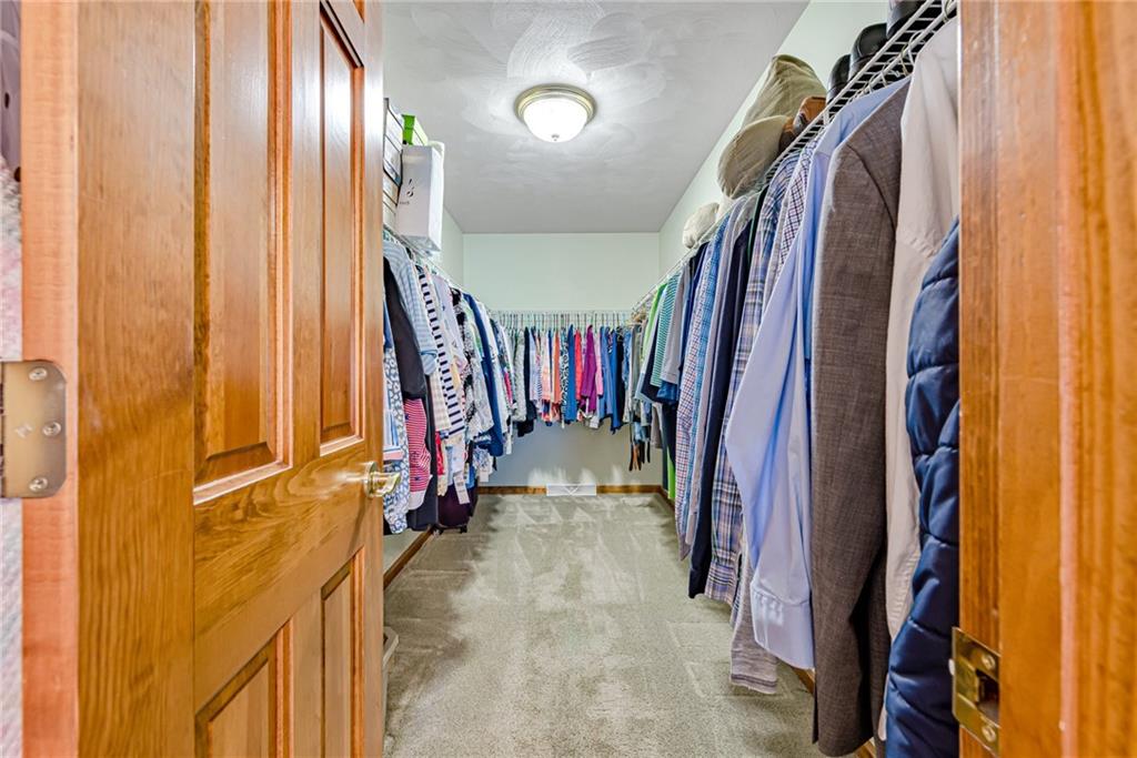 612 Rembrandt Circle Irwin, PA 15642 - Photo 18 of 32 a view of walk in closet with clothes and shoes