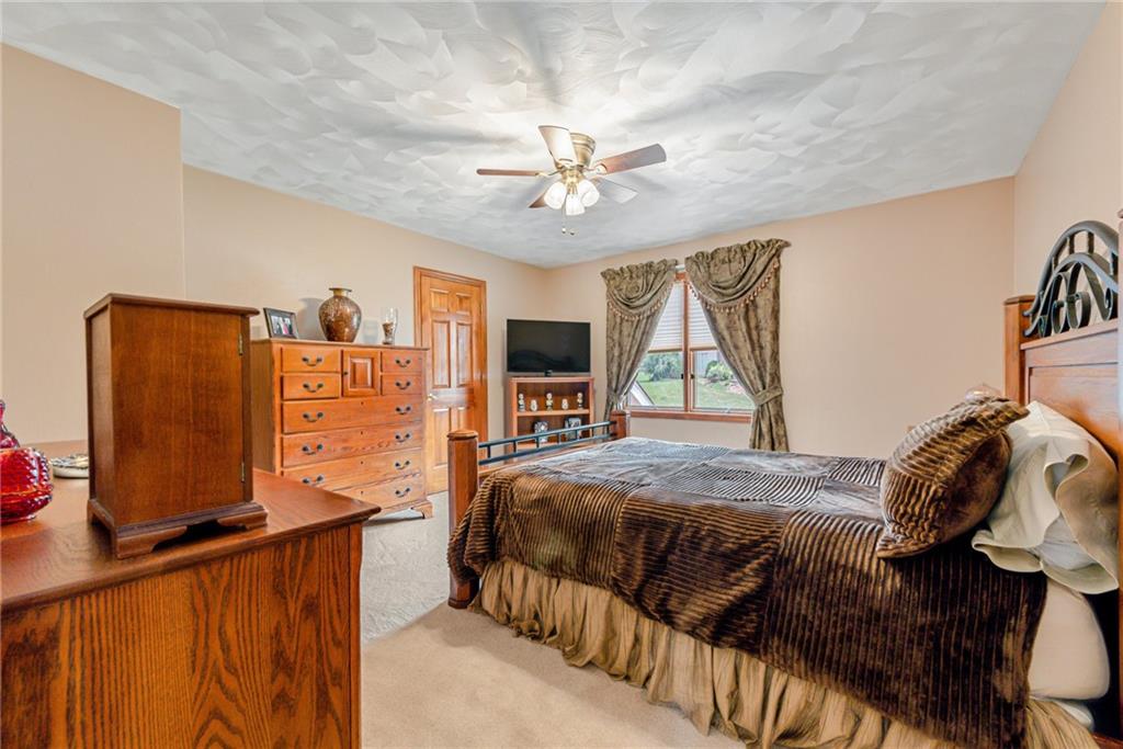 612 Rembrandt Circle Irwin, PA 15642 - Photo 20 of 32 a bedroom with a bed and window