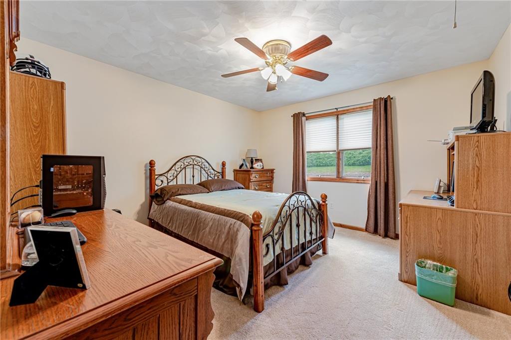 612 Rembrandt Circle Irwin, PA 15642 - Photo 23 of 32 a bedroom with a bed and a large mirror