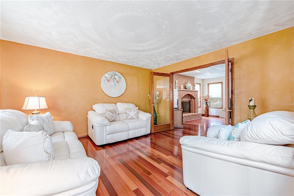 612 Rembrandt Circle Irwin, PA 15642 - Photo 3 of 32 a living room with furniture and a large window