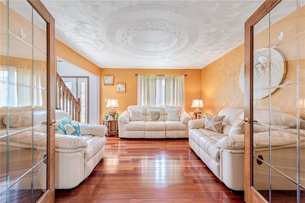 612 Rembrandt Circle Irwin, PA 15642 - Photo 4 of 32 a living room with furniture and a large window