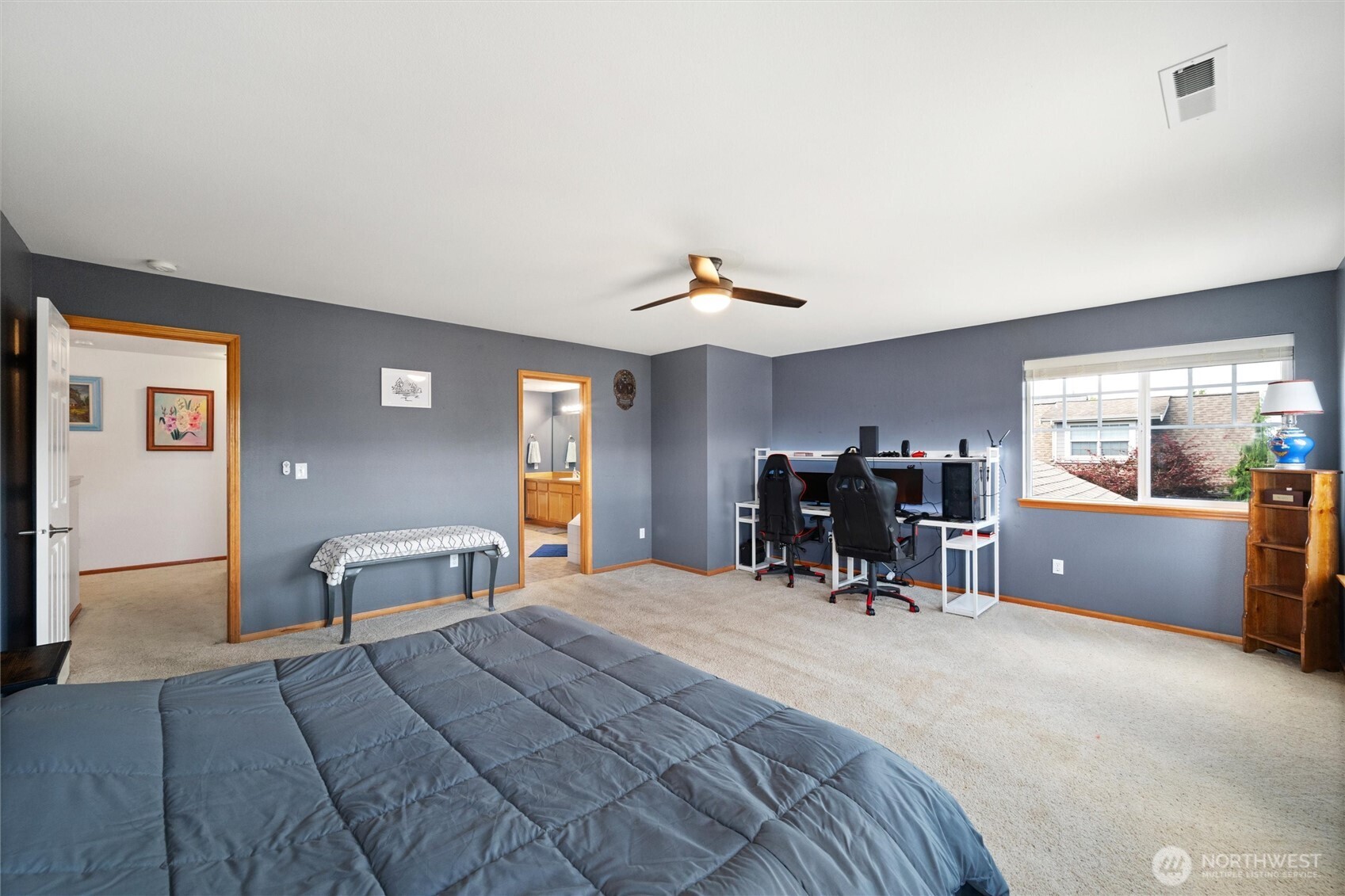 1877 Emerald Way Lynden, WA 98264 - Photo 17 of 33 a bedroom with furniture and a large window