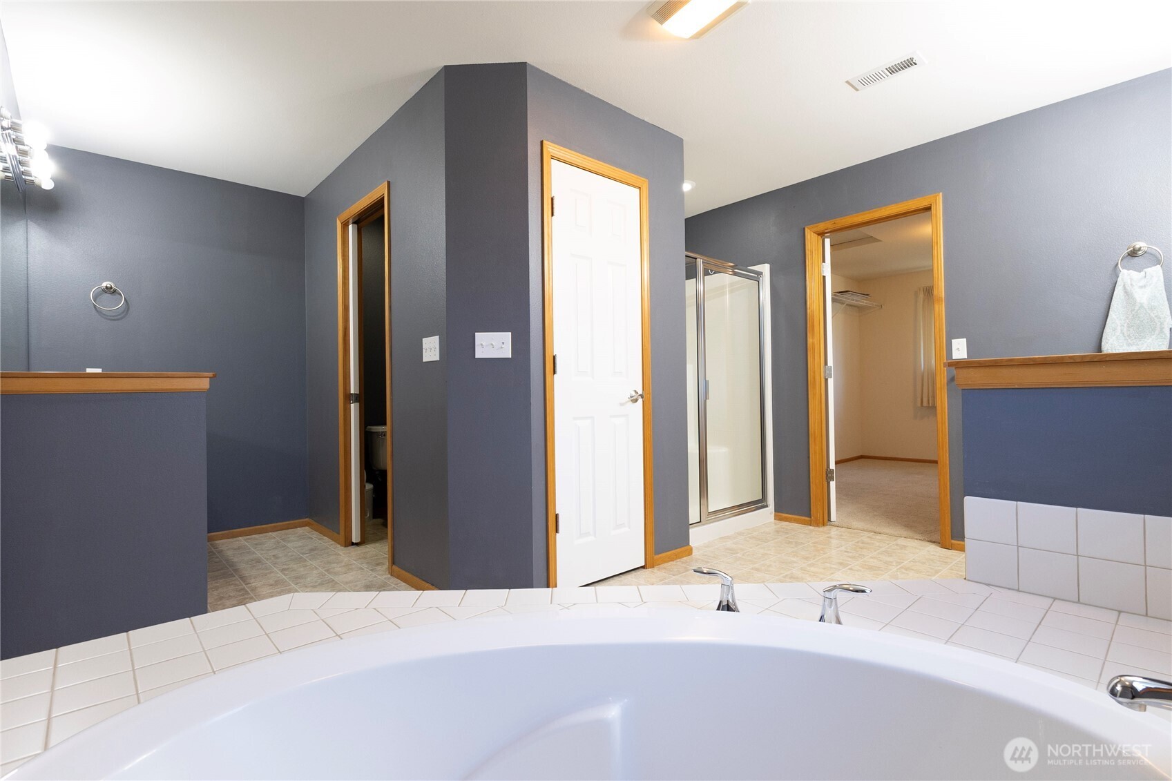 1877 Emerald Way Lynden, WA 98264 - Photo 22 of 33 a bedroom with a bed and a window