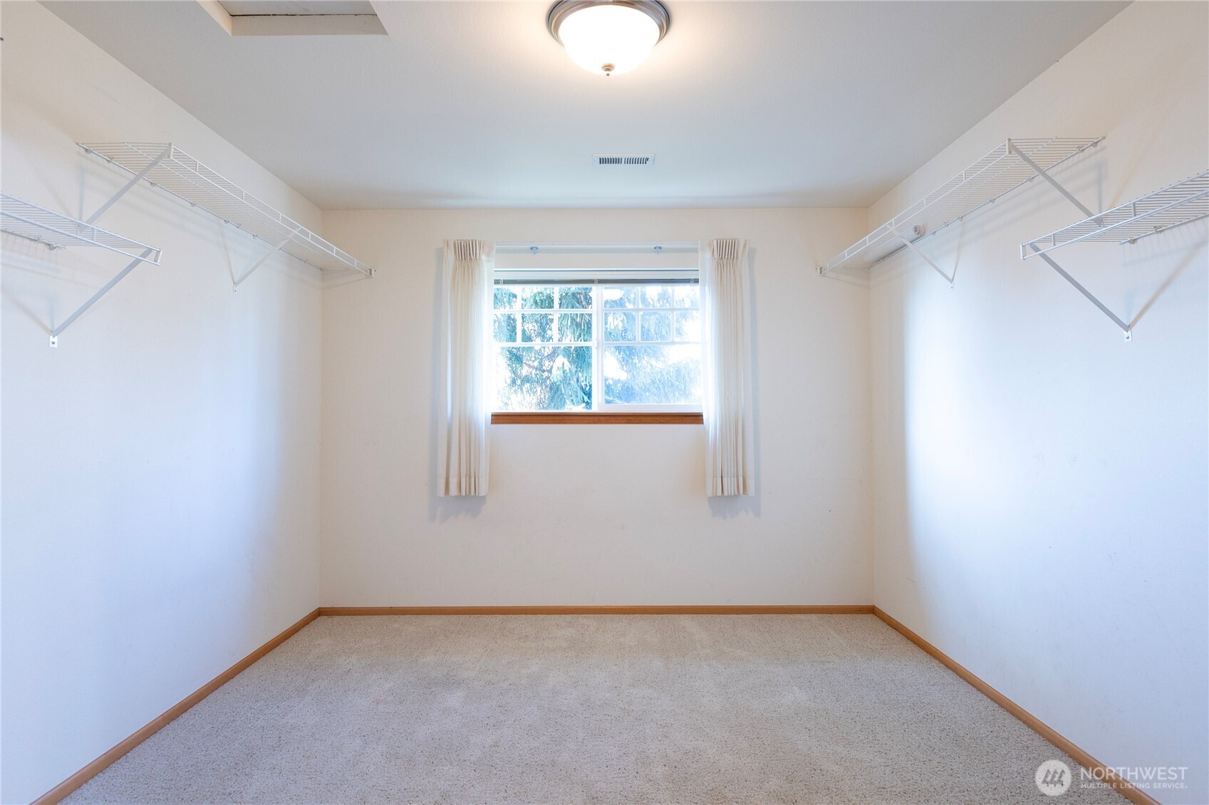 1877 Emerald Way Lynden, WA 98264 - Photo 23 of 33 an empty room with windows