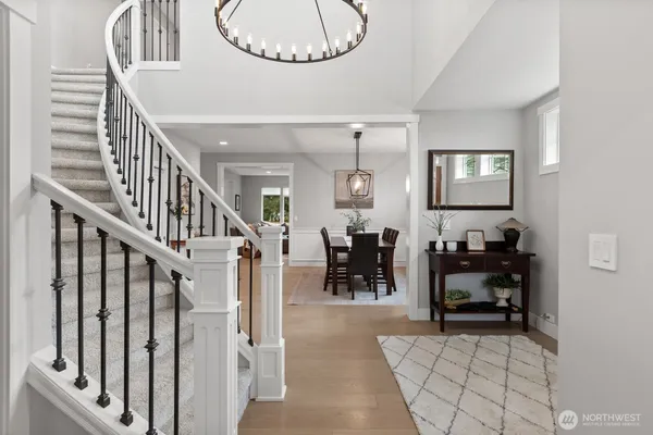 a view of livingroom with furniture and staircase