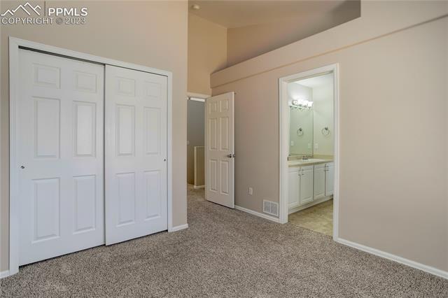 8740 Del Rio Road Peyton, CO 80831 - Photo 15 of 27 Bedroom 3 - main level