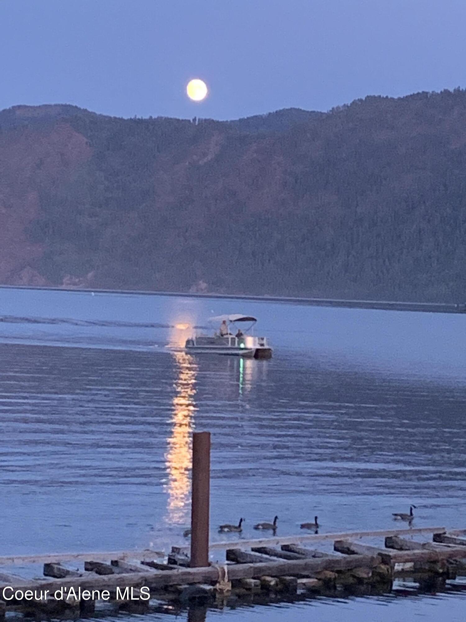 34129 Scenic Bay Road Bayview, ID 83803 - Photo 63 of 72 night boating