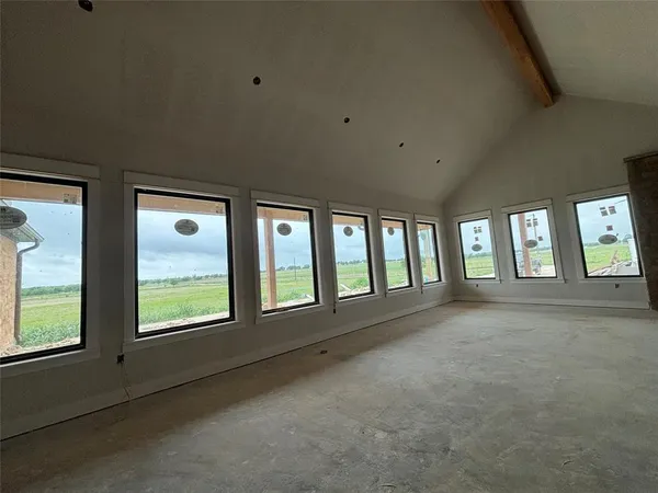 a view of a big room with large windows