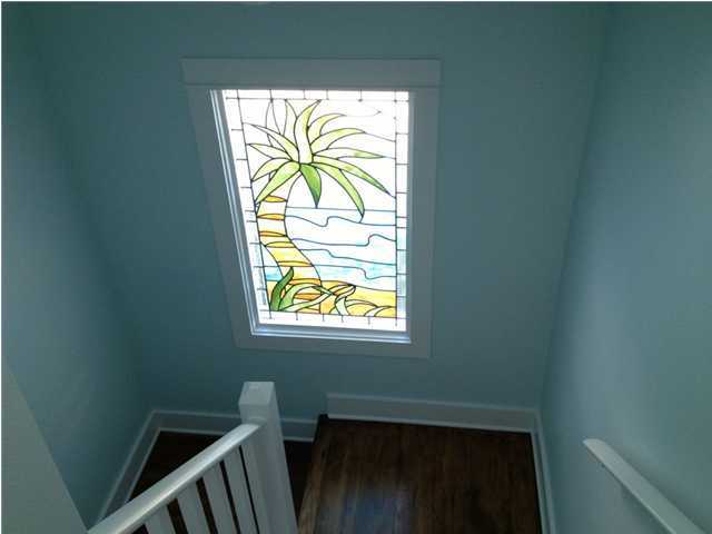 249 Beach Bike Way Seacrest, FL 32461 - Photo 14 of 24 a bathroom with a window and a shower