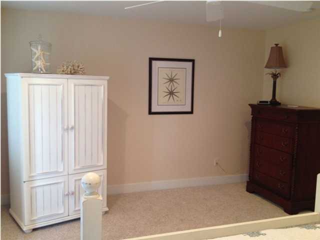 249 Beach Bike Way Seacrest, FL 32461 - Photo 16 of 24 a view of an empty room with wooden floor