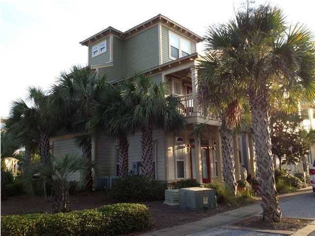 249 Beach Bike Way Seacrest, FL 32461 - Photo 3 of 24 a front view of a house with a yard