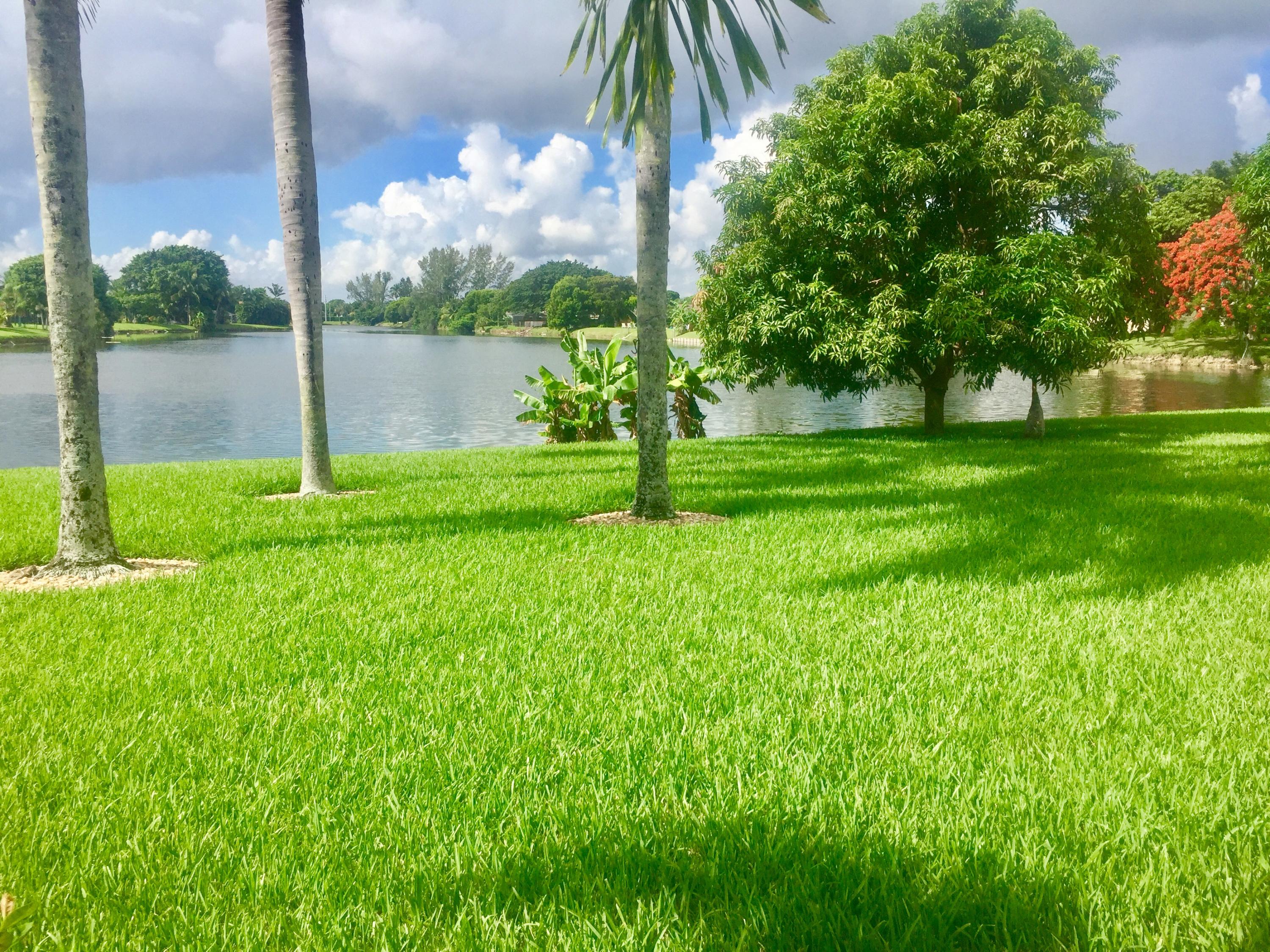 9638 Lancaster Place Boca Raton, FL 33434 - Photo 13 of 26 landscaped backyard