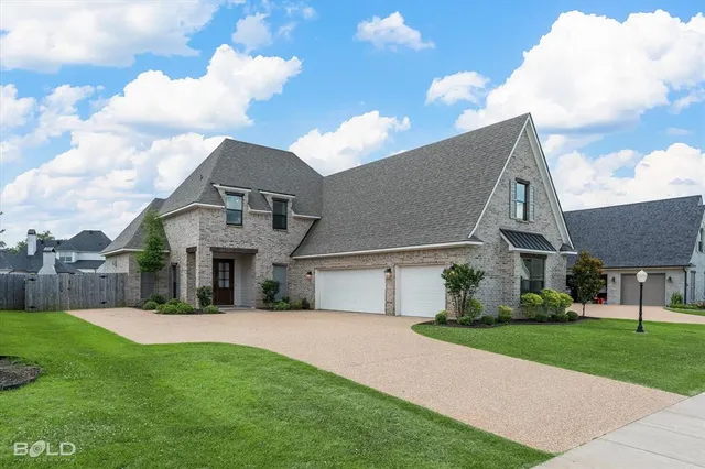 a front view of house with yard