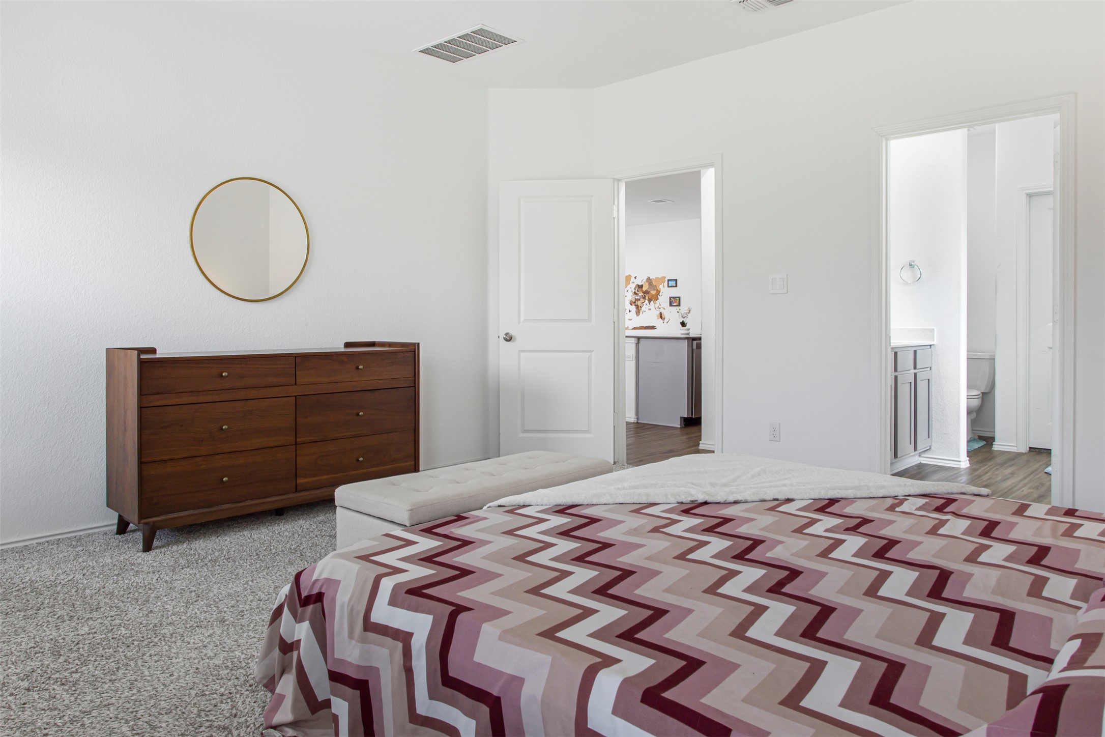124 Cherry Ridge Road Georgetown, TX 78628 - Photo 17 of 23 Bedroom featuring neutral-toned carpet flooring and white painted walls