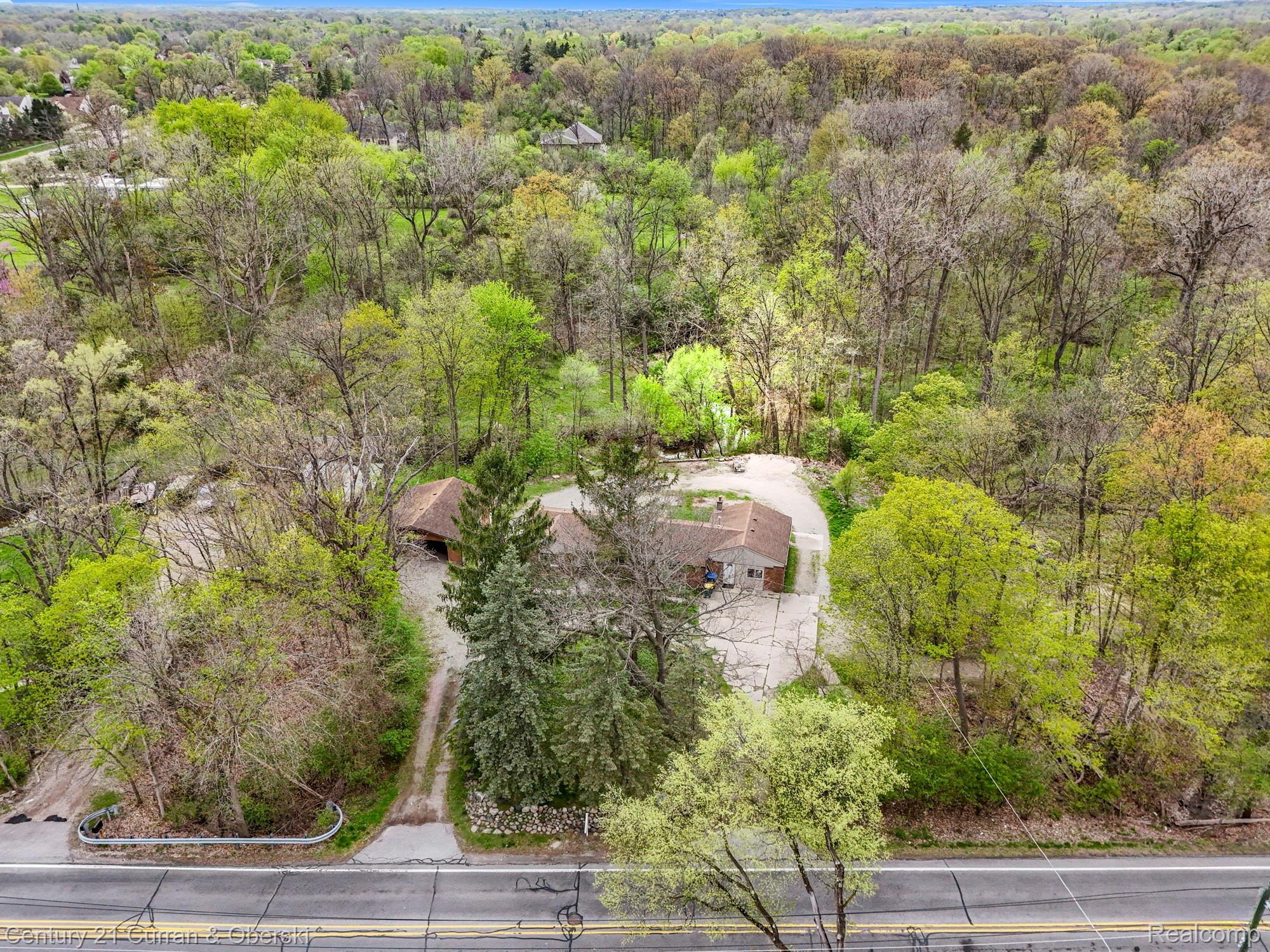 25205 Inkster Road Farmington, MI 48336 - Photo 45 of 46 Drone / aerial view of a forest