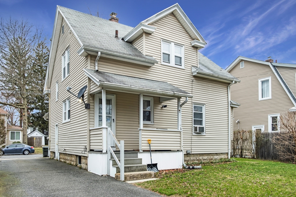 39 Meredith Street Springfield, MA 01108 - Photo 34 of 36 a view of a house with a yard