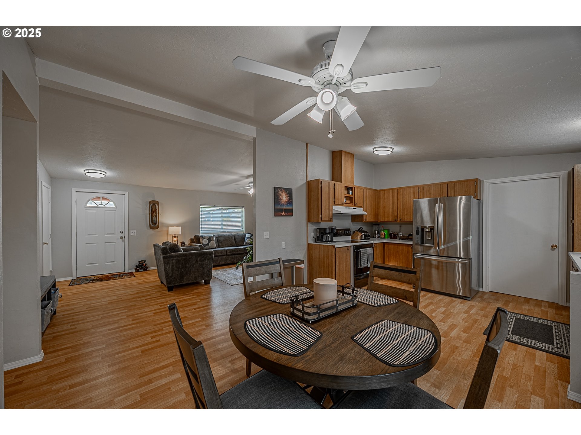 150 North 11th Street Lakeside, OR 97449 - Photo 16 of 37 a living room with furniture and kitchen view